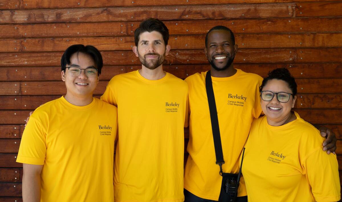 photo of team wearing  yellow t-shirts